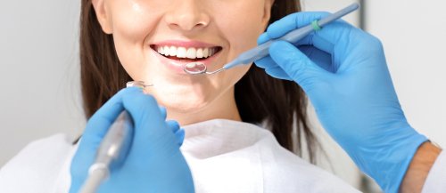 woman getting a dental checkup at My Dentist in Plano