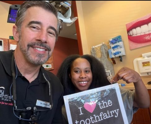 Dr. Darren Dickson with a patient